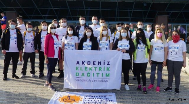 AEDAŞ çalışanları, Runatolia Maratonu'nda omurilik felçlilerinin 'yol arkadaşı oldu'