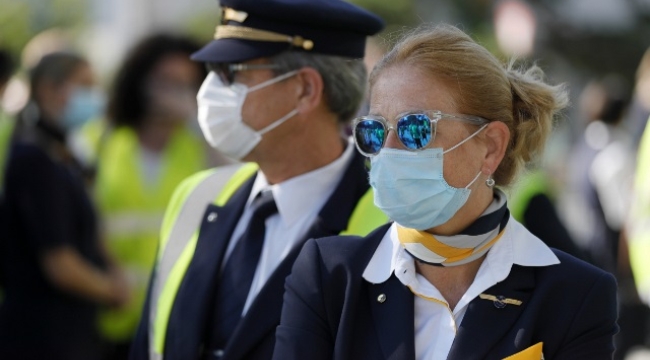 Almanya'da uçakta maske zorunluluğu kalktı