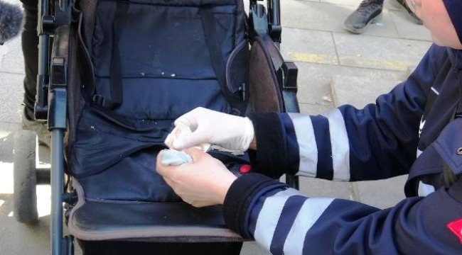 Topladığı paraları bebek arabasına saklamış